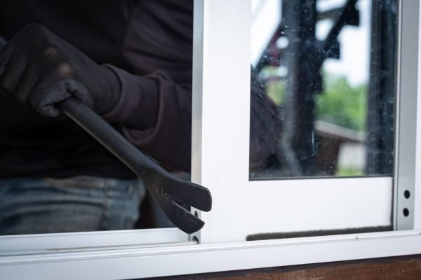 thieves wear black hats pry windows steal things